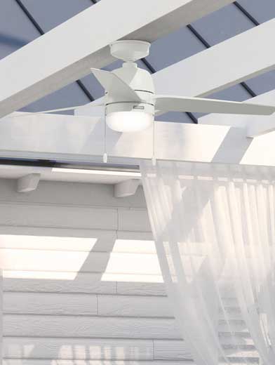 52 inch Seawave Outdoor ceiling fan with LED light in fresh white finish mounted to white pergola.