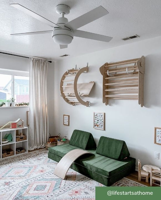 Phenomenon smart ceiling fan with light in matte white finish mounted with downrod in kids room.